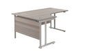 Twin Upright Left Hand Radial Desk (FSC) | 1800X1200 | Grey Oak/Silver